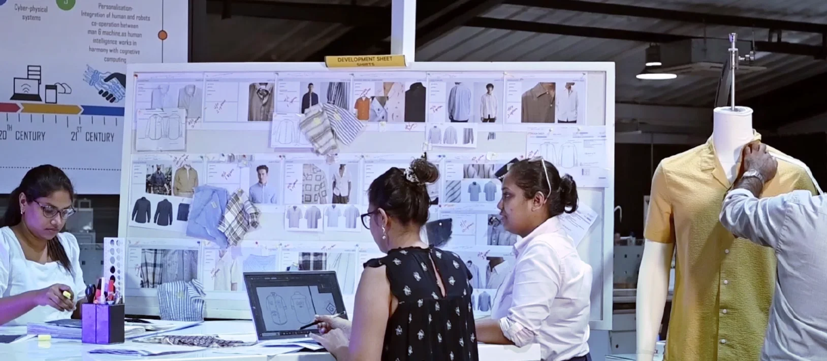 Martex designers working on a development sheet